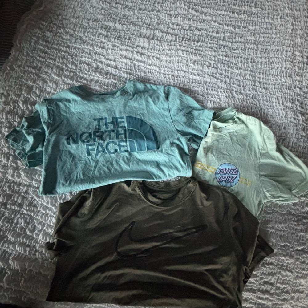 Bundle of 3 men’s size small t-shirts Nike, North Face, and Santa Cruz